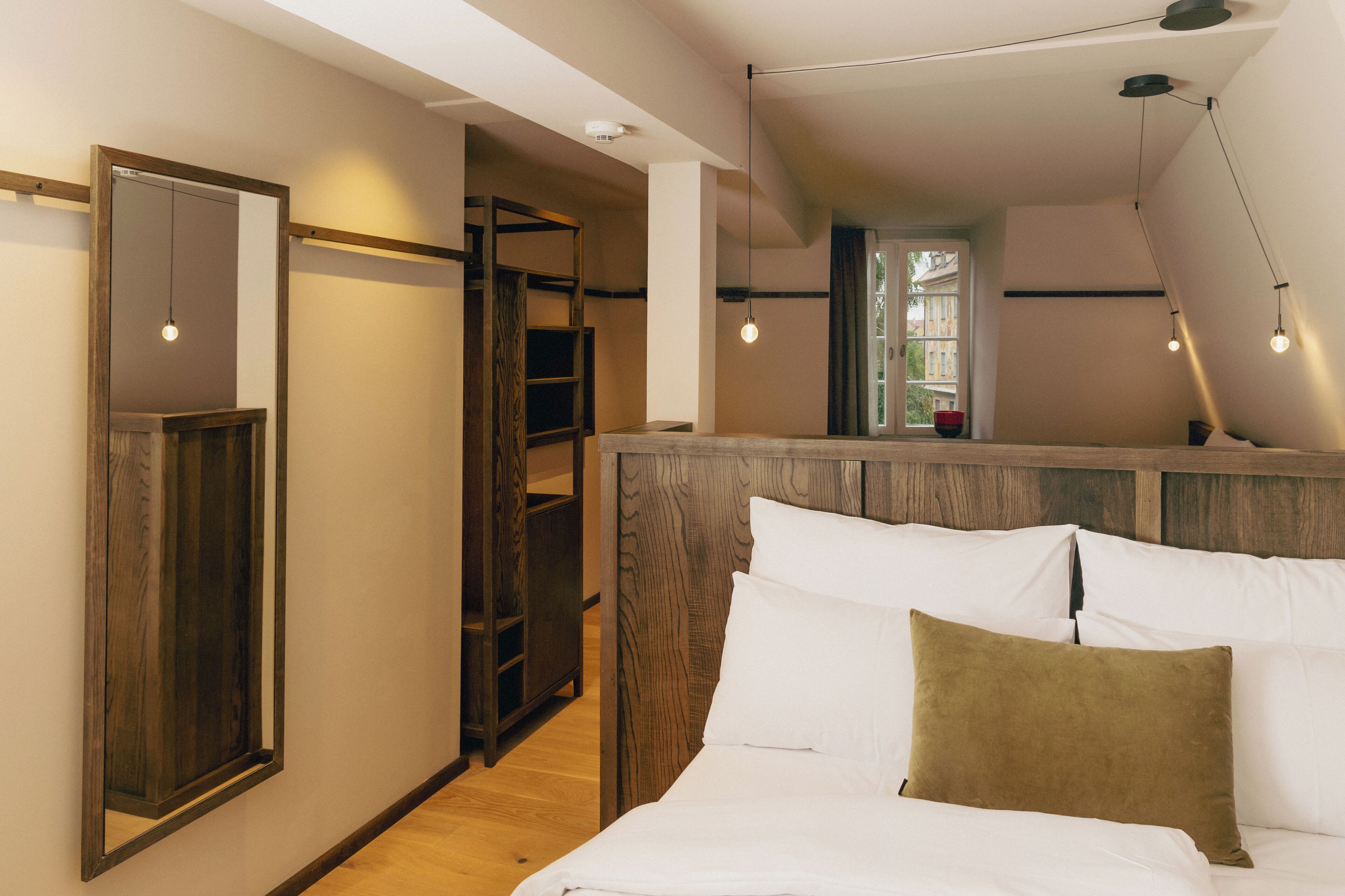 The HOY Suite | In-room safe, desk, laptop workspace, blackout drapes
