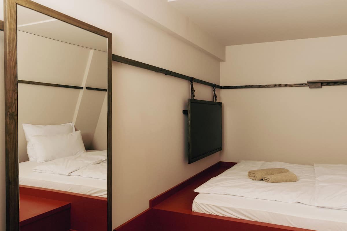 Comfort Double Room, City View | In-room safe, desk, laptop workspace, blackout drapes