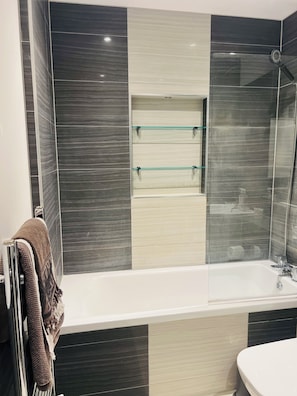 Hair dryer, towels, soap, toilet paper