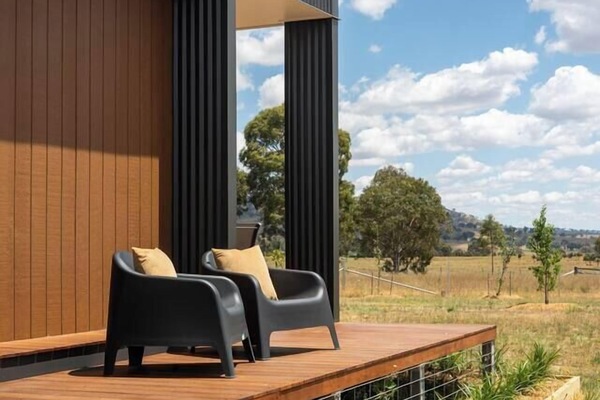 Find a quiet moment with a book or glass of wine as you look out toward open fields and the nearby hills of Mudgee.