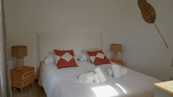 Deluxe appartement, uitzicht op tuin | Verduisterende gordijnen, geluiddichte muren