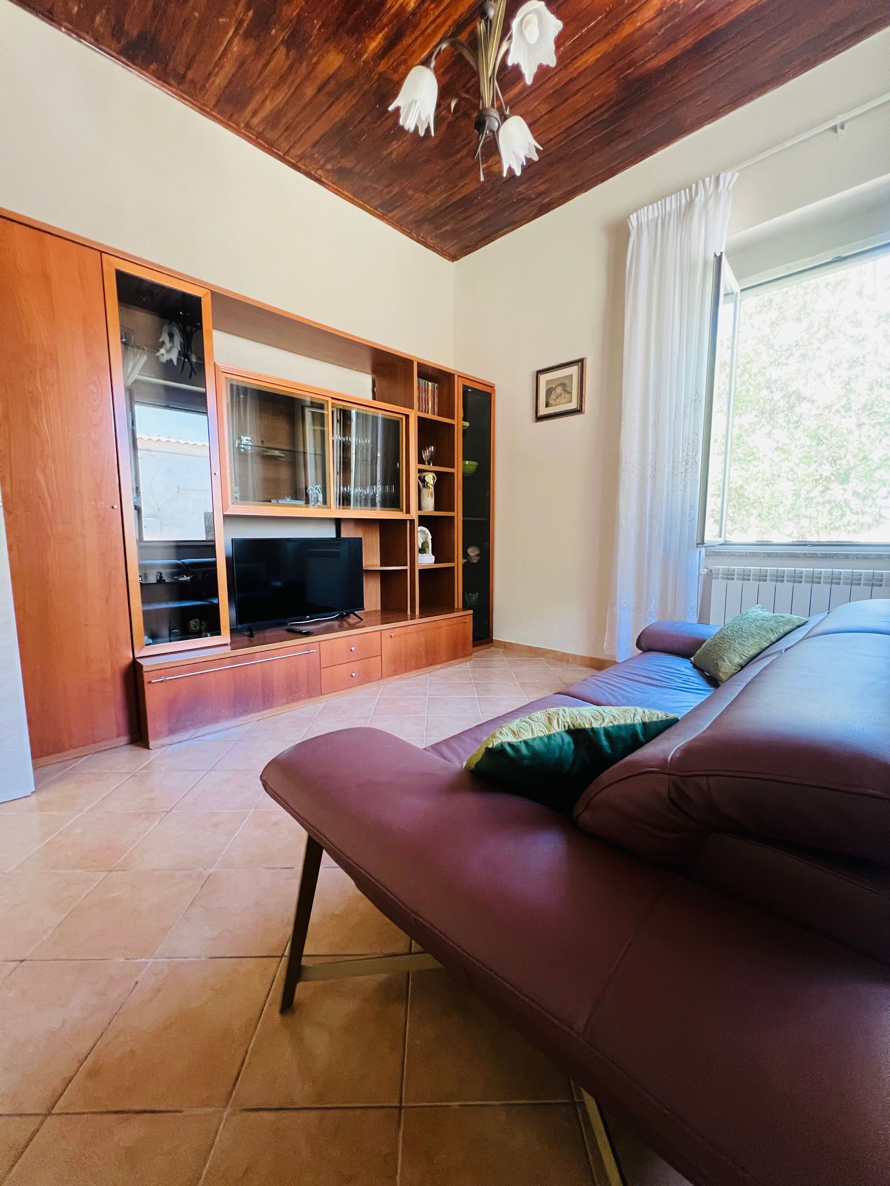 Habitación Deluxe, vista al jardín | Área de sala de estar