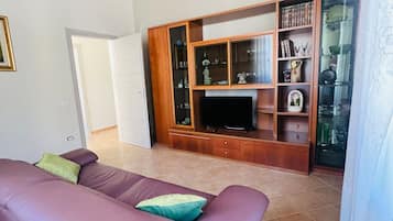 Deluxe-værelse - udsigt til have | Opholdsområde