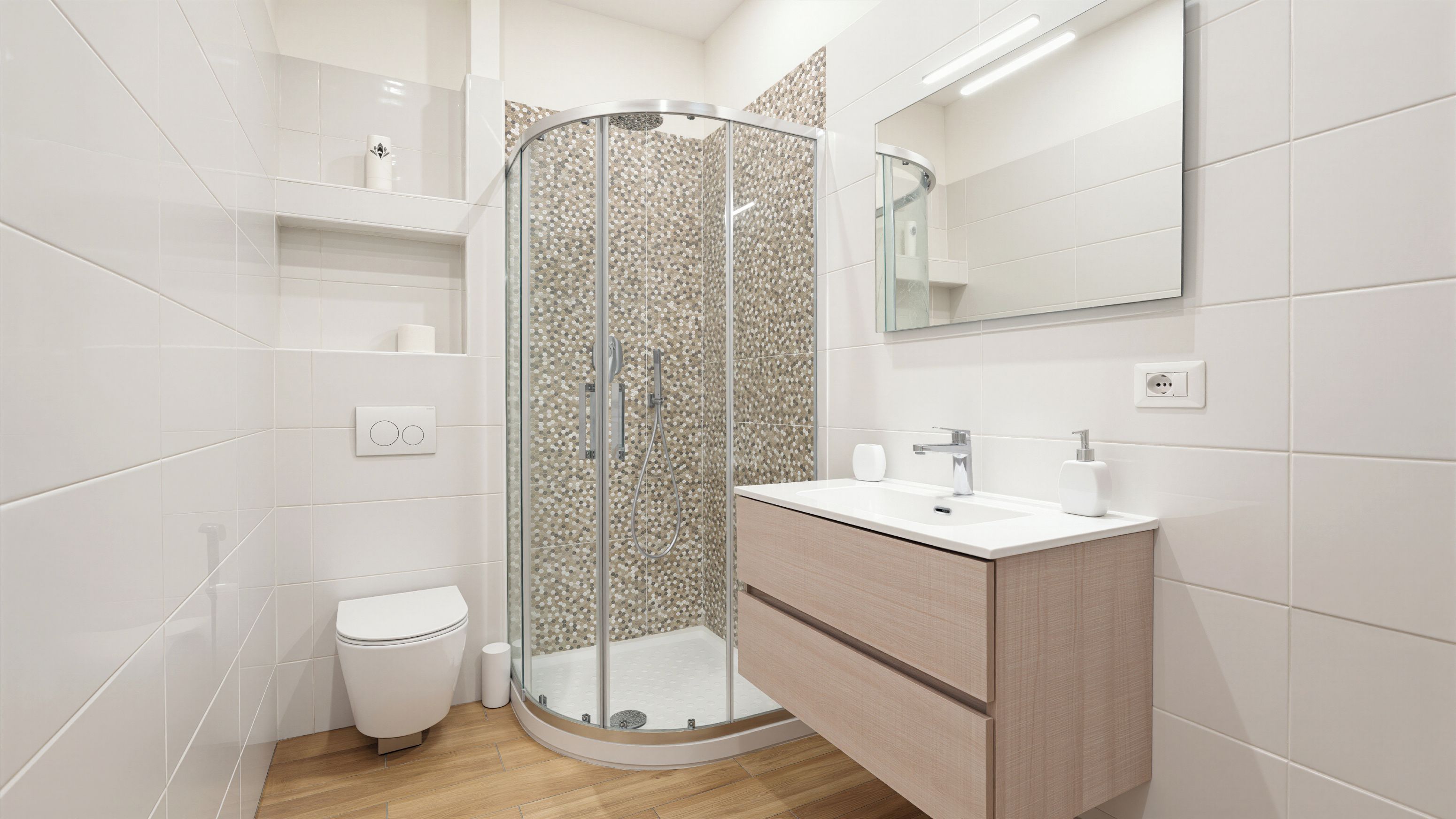 Un baño moderno con ducha envuelta en vidrio, inodoro blanco y tocador con espejo.