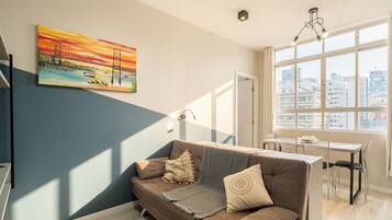 Basic Apartment | Living area | 32-inch Smart TV with digital channels