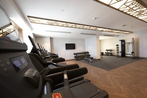 A gym with treadmills, dumbbells, and weight machines. - Hilton Garden Inn Al Khobar King Fahd Causeway (Al Khobar)
