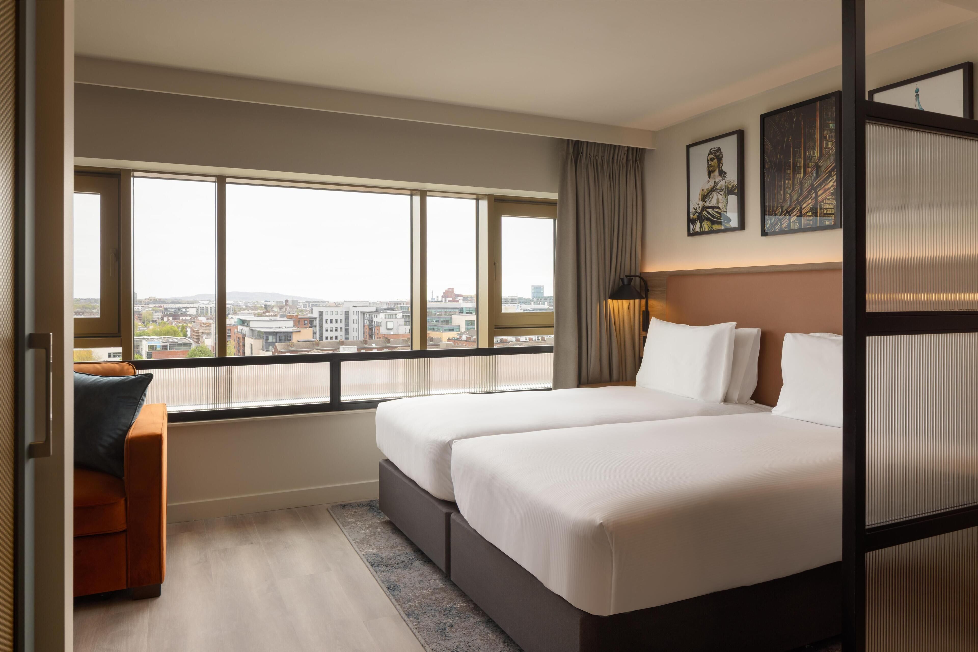 Studio Suite, 2 Twin Beds, City View | Hypo-allergenic bedding, in-room safe, blackout drapes
