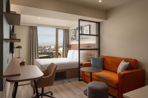 Hypo-allergenic bedding, in-room safe, blackout drapes