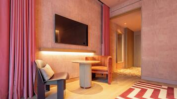 Ropa de cama de alta calidad, minibar, caja fuerte y escritorio