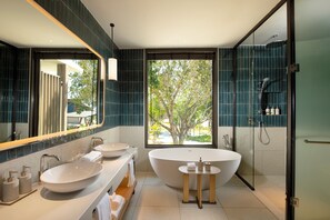 Deluxe Suite, 1 King Bed, Balcony | Bathroom | Rainfall showerhead, free toiletries, hair dryer, bathrobes - Hilton Burau Bay Langkawi Resort (Langkawi)