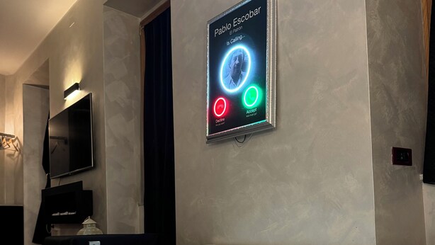 A modern bathroom with a large bathtub, a wall-mounted TV, and a digital display with a circular interface. - The rooms in the People's Square in Rome (Roma)