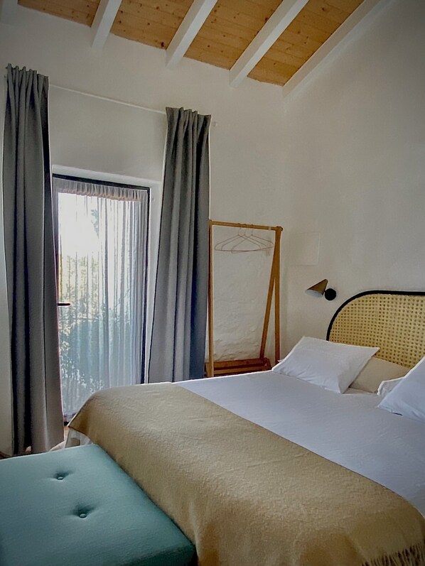 Desk, laptop workspace, blackout drapes, soundproofing