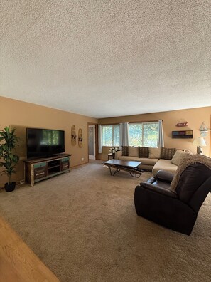 Living area - A lake home on a private peninsula located on Schmidt Lake in Buffalo. (Buffalo)