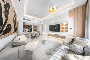 Living area - Bright 3BR by Circle Mall | Family-Friendly, Pool (Dubai)