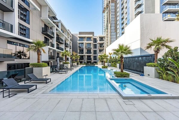 Pool - Bright 3BR by Circle Mall | Family-Friendly, Pool (Dubai)