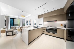 Private kitchen - Bright 3BR by Circle Mall | Family-Friendly, Pool (Dubai)