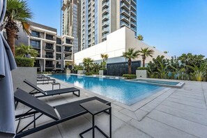 Pool - Bright 3BR by Circle Mall | Family-Friendly, Pool (Dubai)