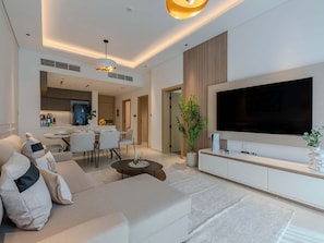 TV, fireplace, offices - 2BR JVC Stay nr Circle Mall | Pool, Gym, & Sauna (Dubai)