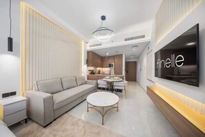 Living area - Modern JVC Studio • Pool, Gym & Kid's Play Area (Dubai)