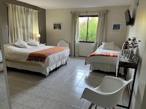 Superior Triple Room, Garden View | In-room safe, laptop workspace, WiFi (free), bed sheets