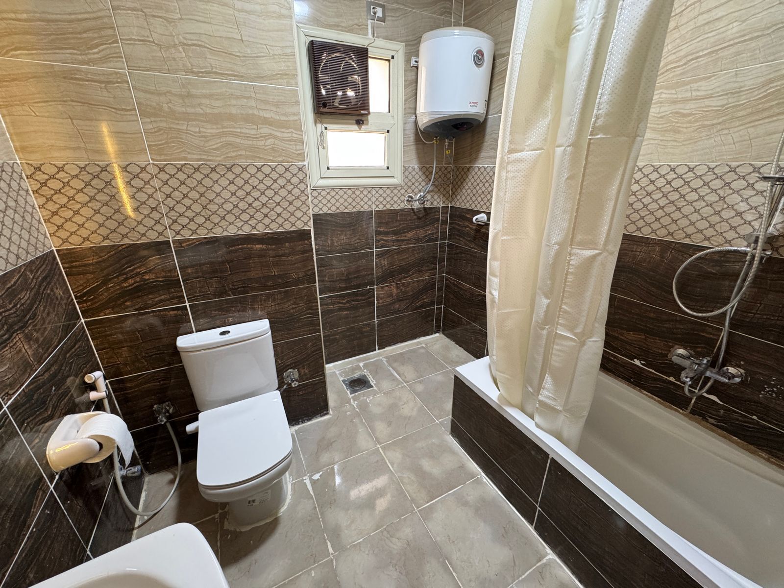 Jetted bath, hair dryer, towels, soap
