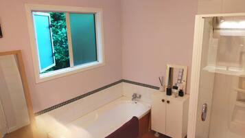 Shower, hair dryer, towels, soap