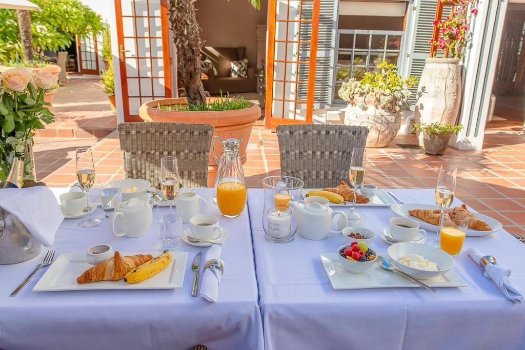 Deluxe-Suite, Terrasse, Gartenblick | Speisen im Freien