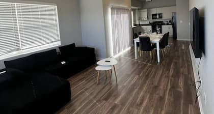 Sleek Black-and-White 2BR with Gym, WiFi & Free Parking