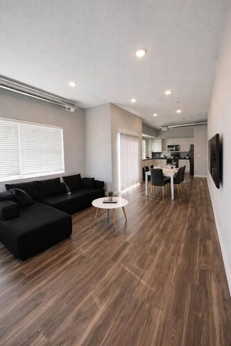 Sleek Black-and-White 2BR with Gym, WiFi & Free Parking