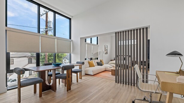 A modern living space with a dining area, a sofa, and a desk. - Cozy / New 2-bedroom apartment in North Hollywood (Los Angeles)