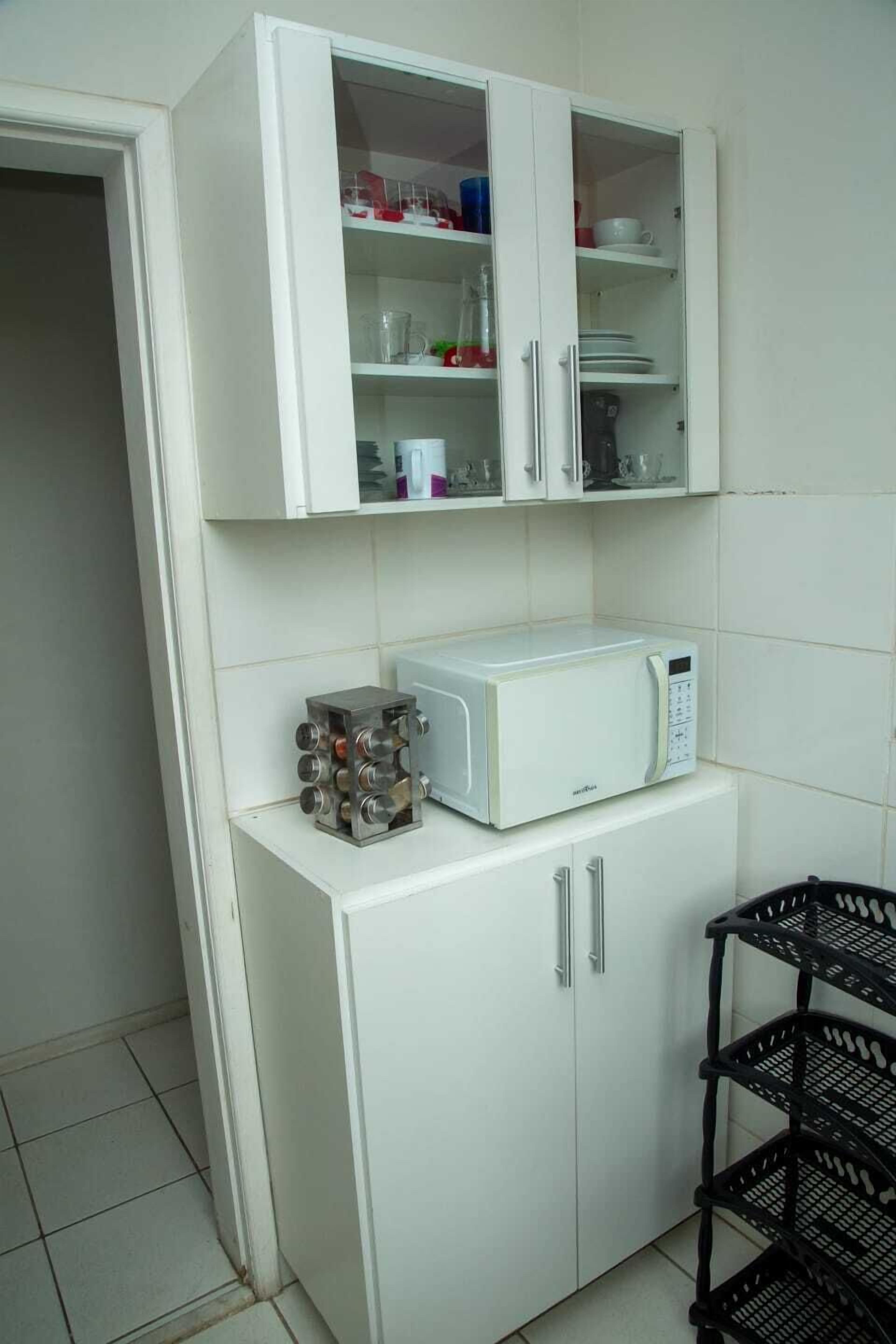 Apartamento, sacada, vista para o jardim | Micro-ondas