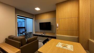 Basic Apartment | Living area | 32-inch Smart TV with digital channels