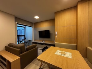 Basic Apartment | Living area | 32-inch Smart TV with digital channels