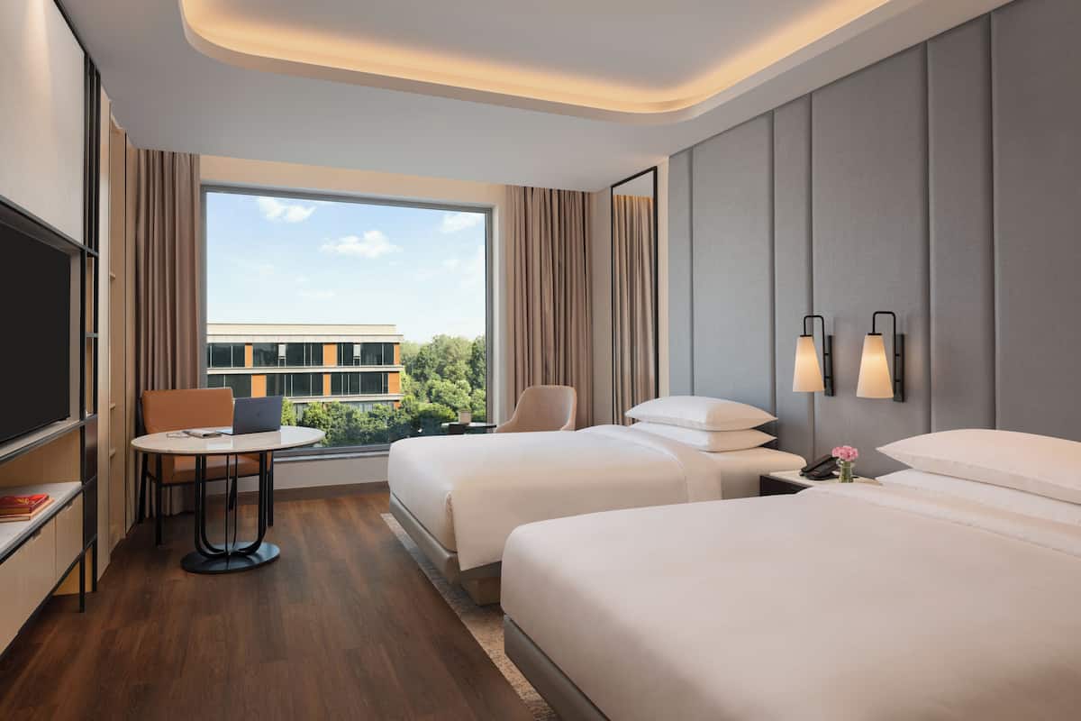 Luxury Apartment, 2 Bedrooms, Non Smoking, Pool View | Pillow-top beds, laptop workspace, free cots/infant beds, free WiFi