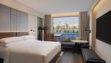 Deluxe Room, 1 King Bed, Pool View (View) | Pillow-top beds, free cots/infant beds, free WiFi, bed sheets