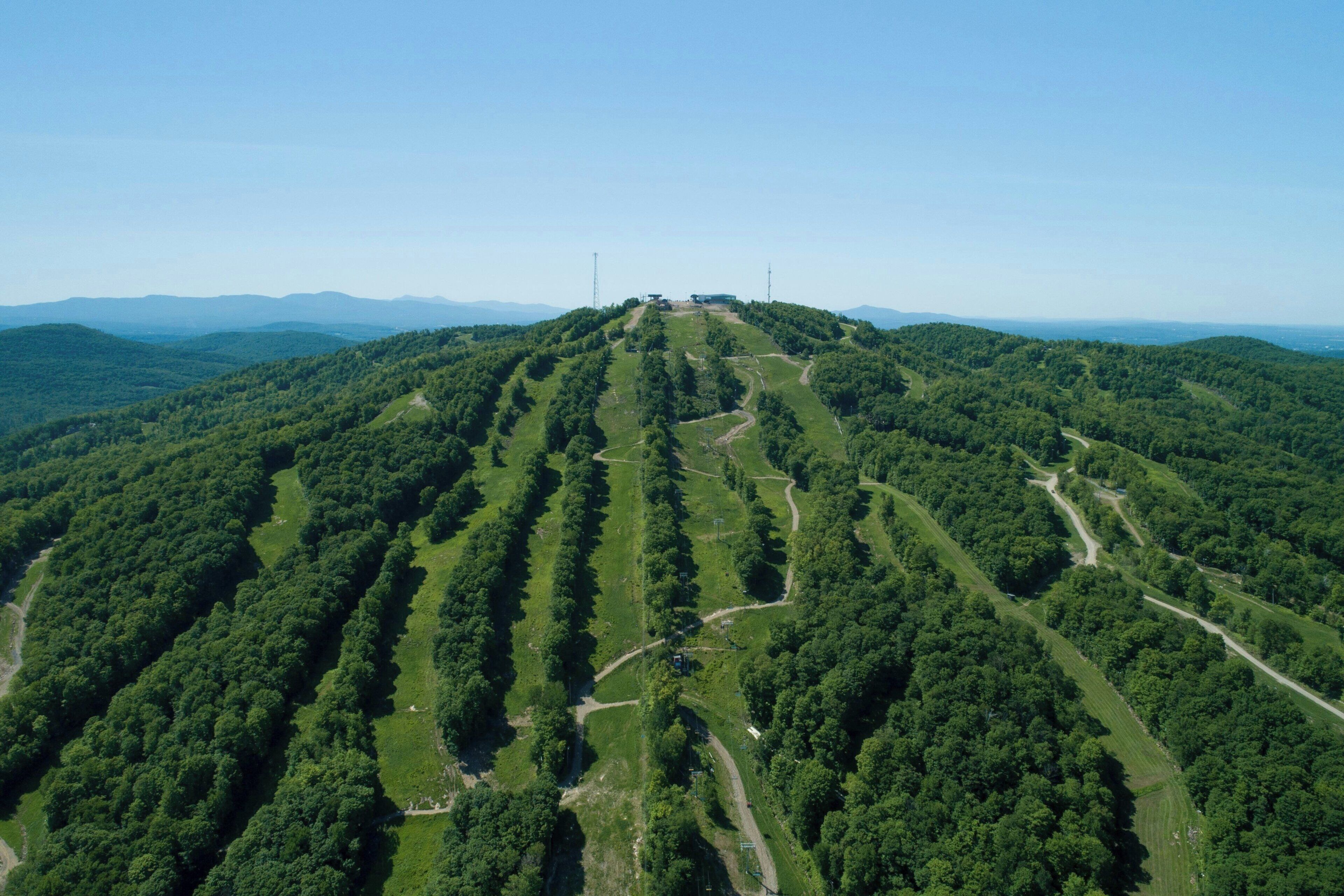 A mountainous landscape with a clear sky.