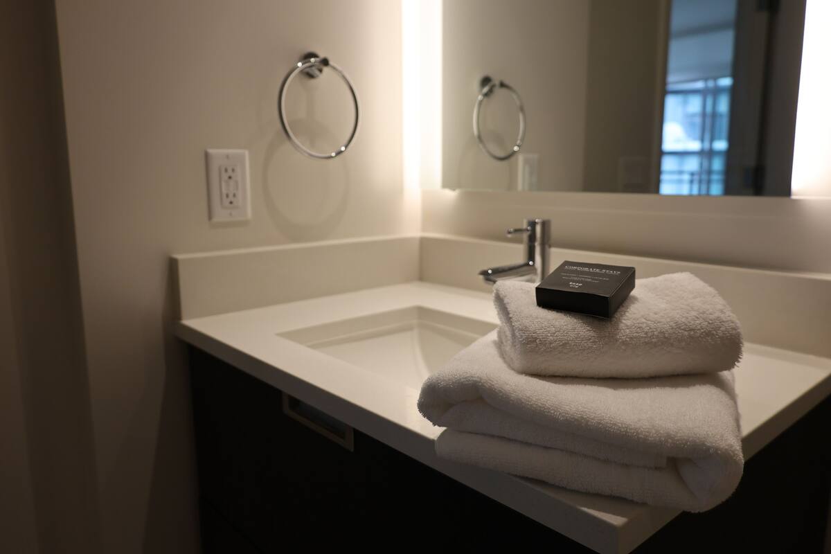 Hair dryer, towels, soap