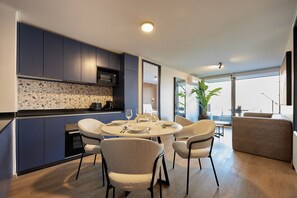 Suite Deluxe, 2 habitaciones, no fumadores, terraza (Superior) | Zona de estar