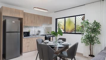 Family Apartment | Private kitchen | Full-size fridge, microwave, cookware/dishes/utensils