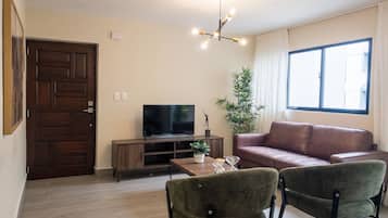 Apartamento família | Área de estar