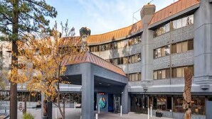 A modern building with a curved roof and a large entrance. - 2 bedroom unit, sleeps 6 for Christmas week across Heavenly Valley Ski Resort (South Lake Tahoe)