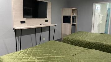 Deluxe Quadruple Room, 2 Queen Beds | Free WiFi