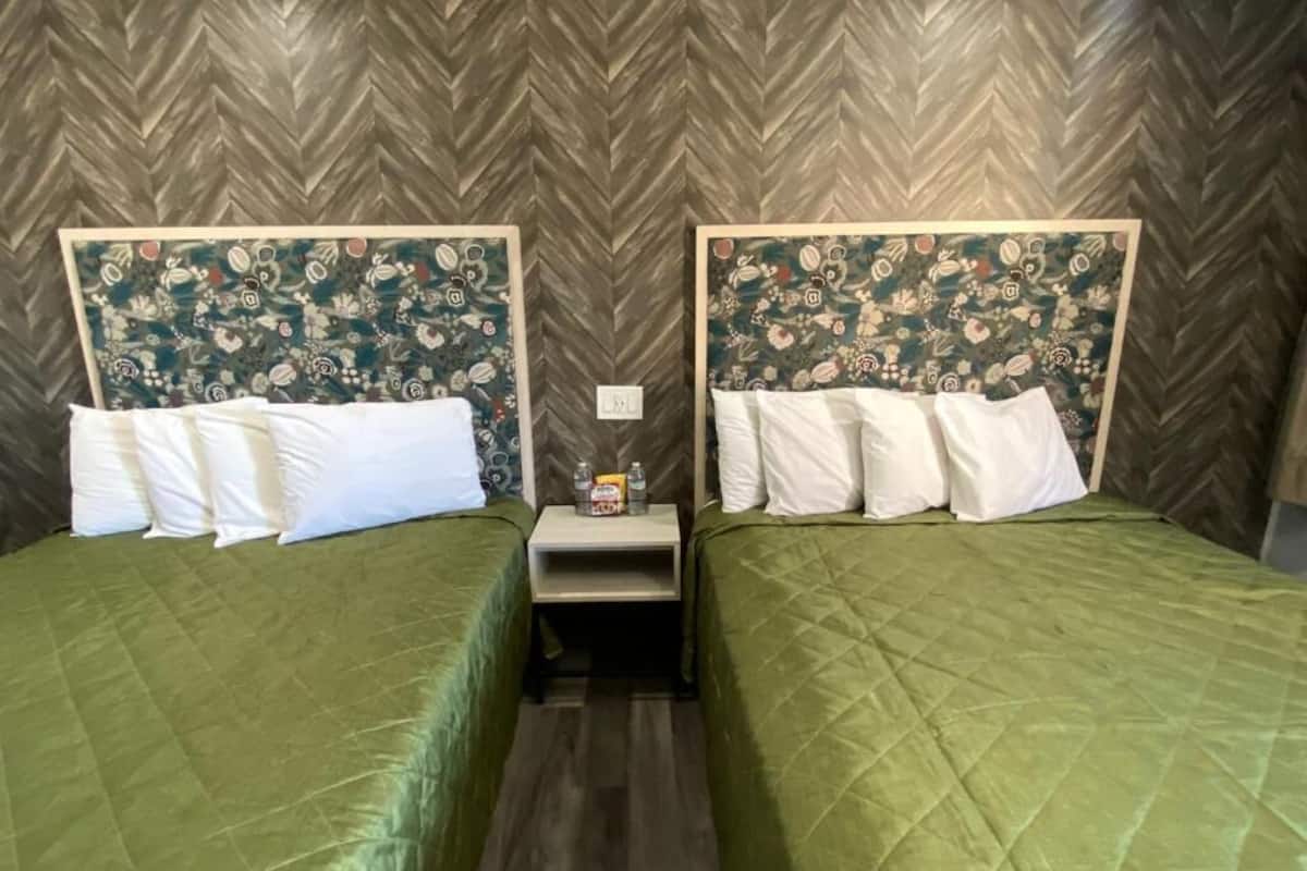 Deluxe Quadruple Room, 2 Queen Beds | Free WiFi