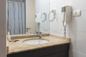 Hair dryer, towels, soap, toilet paper