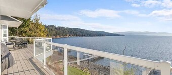 Lakefront luxury with dock and views near Gozzer