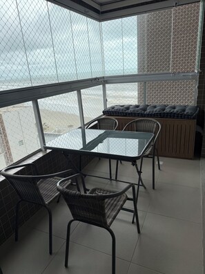 Dining - Beachfront apartment with charcoal grill and free Wi-Fi.  (Praia Grande)