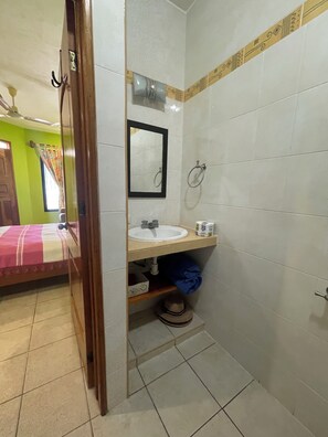 Shower, towels, soap, toilet paper