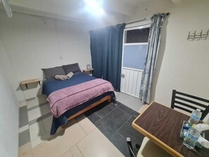 Habitación doble, patio, vista al patio | Wifi gratis 