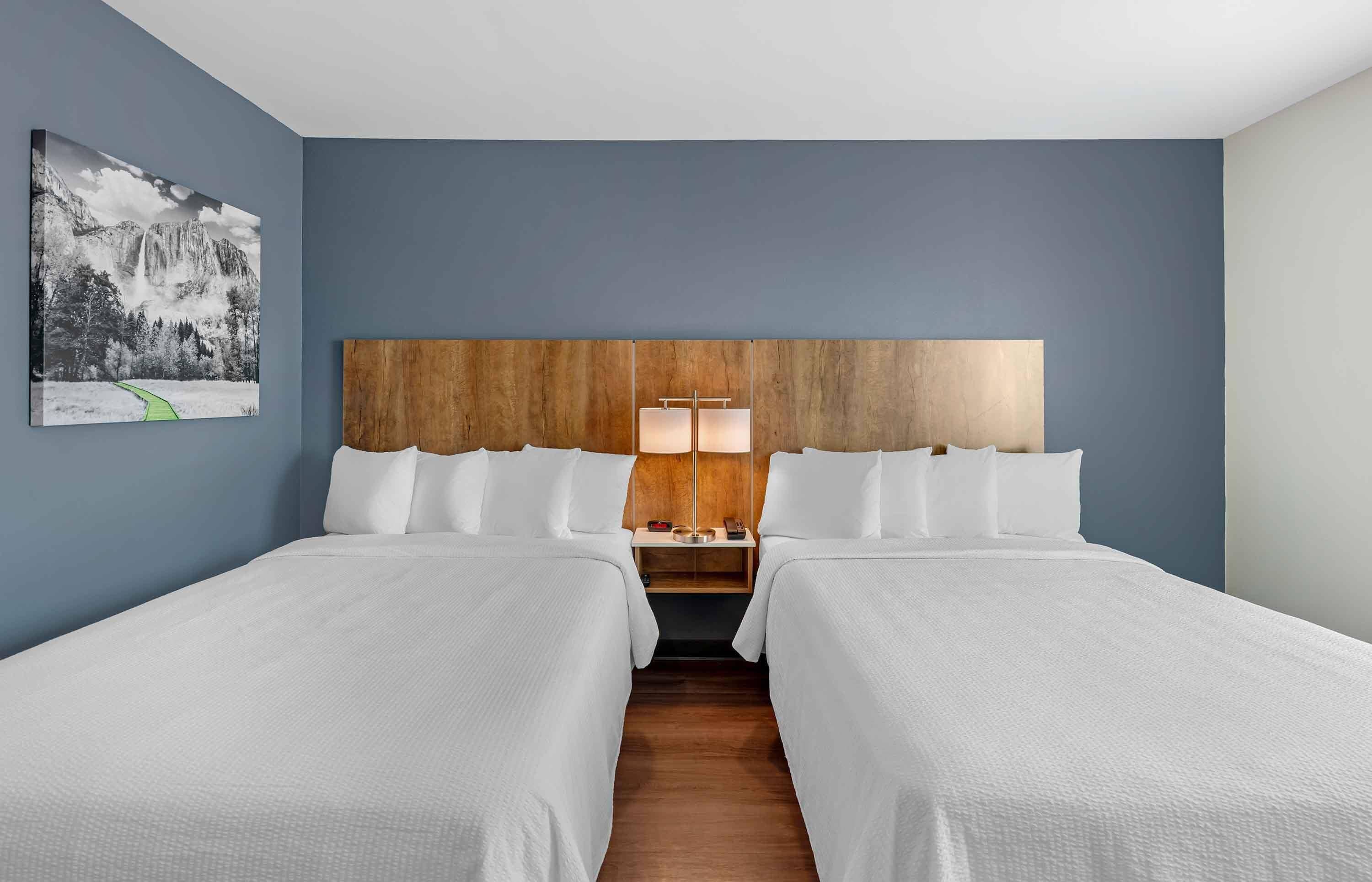 Standard Studio, 2 Queen Beds, Refrigerator & Microwave | Premium bedding, laptop workspace, iron/ironing board, free WiFi