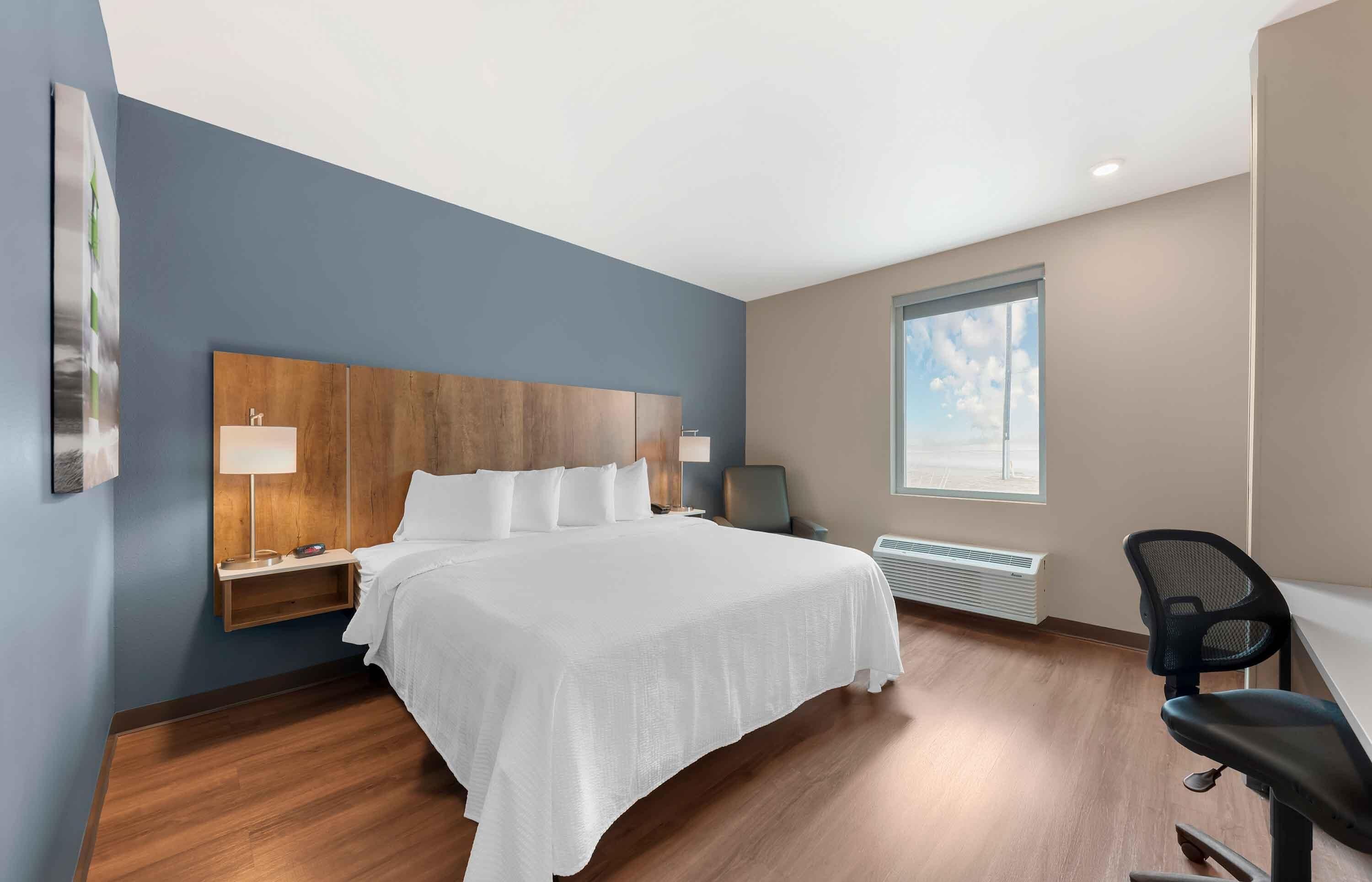 Premium bedding, laptop workspace, iron/ironing board, free WiFi